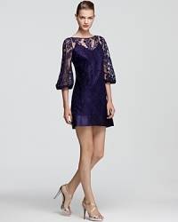 Patterned lace goes luxe with sumptuous satin trim. From Laundry by Shelli Segal.