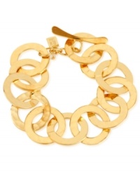 Expand your circle of influence with this bracelet from Robert Lee Morris. Crafted from gold-tone mixed metal, the bracelet rounds out any ensemble. Approximate length: 7-1/2 inches.