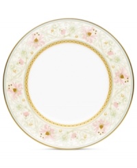 East meets West in the ornate Blooming Splendor accent plate by Noritake. A Japanese-inspired pattern with raised dots pairs with intricate florals rooted in white bone china.