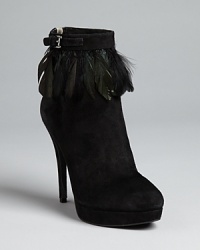 Feather accents encircling each cuff make this pair of MICHAEL Michael Kors nubuck booties soar to new fashion heights.