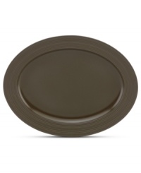 Elegance comes easy with the large Fair Harbor oval platter. Durable stoneware in a warm mocha hue is half glazed, half matte and totally timeless. From the kate spade new york dinnerware collection.