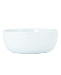 Clean up your table with the minimalist shapes and pure white glaze of Dansk's Arabesque White dinnerware. Dishes like this ultra-smooth porcelain serving bowl combine unparalleled versatility and less-is-more style with durability for daily use. (Clearance)