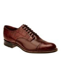 Featuring both smooth and croc-printed leather, this pair of cap toe oxford men's dress shoes offers a unique combination of textures and style.