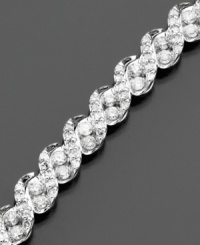 A brilliant diamond bracelet for your wrist. This extraordinary bracelet features diamonds (3 ct. t.w.) cast in 14k white gold in a beautiful rope pattern. Measures 7 1/2 long.