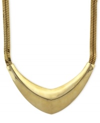 Futuristic fashion. Vince Camuto's double-chain statement pendant necklace is crafted from gold-tone mixed metal, giving it a post-modern look. Approximate length: 18 inches.