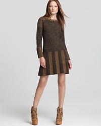 Quirky goes cool as statement pattern lends eclectic inspiration to a sumptuous Burberry Brit sweater dress.