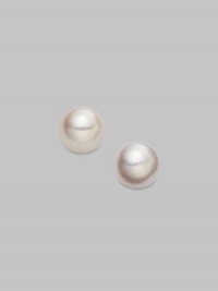 Classic, elegant stud earrings set in 18K yellow gold. 4.5mm white cultured pearls 18K yellow gold Post backs Imported 