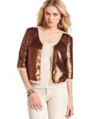 Allover high-shine sequins makes this metallic GUESS cropped jacket a surefire pick for an ultra-chic layered look!