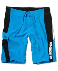 Attractive and sporty boardshorts by Quicksilver is also uniquely water repellent.