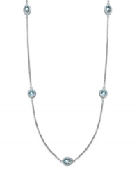 Short and traditional. This luminous strand necklace features round and oval-cut blue topaz (5 ct. t.w.) strung from a delicate sterling silver chain. Approximate length: 17 inches.