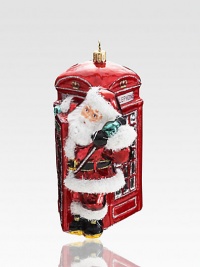 Father Christmas takes a trip across the pond in this eye-catching tree-trimmer, rendered in exquisite mouthblown and hand-painted glass.Hand-painted glass6 highImported