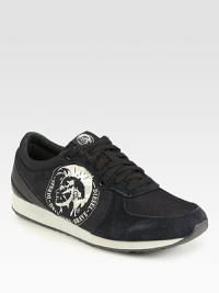 Make a remarkably bold style statement in this eye-catching lace-up, constructed in a smooth combination of suede and nylon with signature logo detail.Suede/nylon upperPadded insoleRubber soleImported