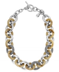 Jungle love. This summer calls for an intricate blend of chic earth tones and shimmer. Michael Kors trendy toggle necklace hits the nail on the head with its acetate horn and glass-accented links. Crafted in silver tone mixed metal. Approximate length: 17 inches.