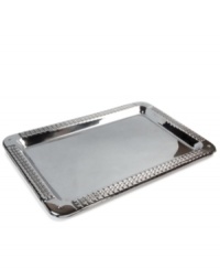 Engraved for timeless style in stainless steel and silver plate, the Watchband bar tray from Lauren Ralph Lauren adds sleek polish to cocktail service.