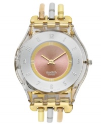 A harmonious blend of warm tones create a lovely effect on this elegant Tri-Gold collection Swatch watch.