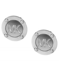 It's all in the name. Michael Kors' edgy stud earrings feature stud and logo detail in silver tone mixed metal. Approximate diameter: 1/2 inch.