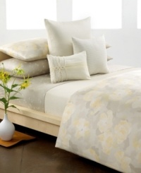 Calvin Klein's Poppy comforter set transforms your space into a beautiful oasis with watercolor florals on soft cotton sateen. Reverses to self.