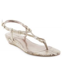 A cute covered wedge. The shiny python print gives the Cyprus wedge sandals by Alfani an edgy quality.