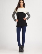 Slouchy-chic boatneck of wool and cashmere has dropped shoulders, long dolman sleeves and a modern colorblock pattern. BoatneckDropped shouldersLong dolman sleevesHi-low hem hits below the hips70% wool/30% cashmereDry cleanImportedModel shown is 5'10 (177cm) wearing US size Small.