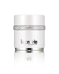 The White Caviar Illuminating Système combines luxury and innovative technology to offer the most advanced anti-pigmentation and firming benefits available from cosmetic treatments. It is a multi-tasking système of fast-penetrating formulas that drench skin with moisture, each product adding to brilliant lightening, brightening and lifting effects with unparalleled luxury. The White Caviar Illuminating Cream contains powerful actives for lightening, detoxifying, moisturizing and firming in one formula. This blissfully light and luxurious cream drenches the skin with moisture as it lightens, brightens, and lifts, giving you a more even skin tone, with improved firmness. Pearlescent powders in the cream give immediate illumination while a complex of brightening ingredients works to control age spots and discoloration on the skin's surface. Continued use gives you brighter, younger-looking skin as dark spots are prevented, and your skin is firmed, moisturized, and protected from environmental damage.Over time, you'll be rewarded by extraordinary results: age spots are diminished, surface darkness fades away, future spots are put on hold, and iridescent pigments reflect light brilliantly, as luminosity is restored and amped to a glowing radiance.