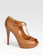 Leather peep-toe design with an adjustable t-strap. Self-covered heel, 5 (125mm)Covered platform, 1 (25mm)Compares to a 4 heel (100mm)Leather upperLeather lining and solePadded insoleMade in ItalyOUR FIT MODEL RECOMMENDS ordering true size. 