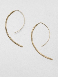 Delicate faceted beads line up along the arc of an artfully shaped hoop with a modern appeal.14k yellow goldLength, about 2Hoop wireMade in USA