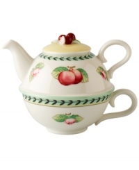 Bring the lush bounty of the French countryside to your table with this charming tea set. Sculpted summer fruits and leaf garland adorn a stacked porcelain teapot and cup from Villeroy & Boch.