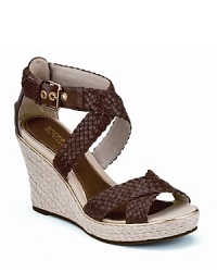 In chic braided leather, the Harbordale wedges supply dressed-up summer style. From Sperry Top-Sider.