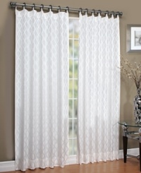 A simple latticework design is made exquisite in combination with a detailed jaquard weave upon this Tuxedo window panel from Regal. Its unique decorative metal grommet tab top makes hanging easy while putting fashion forward.