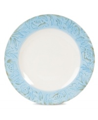 Sculpted blooms and a classic silhouette make the Toulouse dinner plates by Fitz and Floyd a charming part of any casual landscape. A rustic sky-blue glaze adds to its antique appeal.