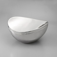 Designed by Neil Cohen, the sweeping piece features a flowing, organic rim with smoothly upswept sides and scooped handles for a look that is ready to take wing. The Butterfly casserole dish is gleaming and gorgeous, the piece comes in three sizes for a lifetime of usefulness and appreciation.