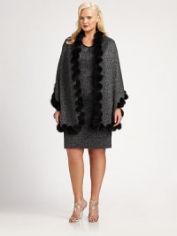 Wrap yourself in the glittering glamour of a sparkle knit ruana, opulently edged with scalloped fox fur trim.Wool/viscose/polyester; dyed shadow foxDry cleanMade in ItalyFur origin: Finland