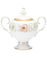 East meets West in the ornate Blooming Splendor sugar bowl by Noritake. A Japanese-inspired pattern with raised dots pairs with intricate florals rooted in white bone china.