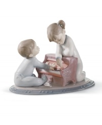 Play nice. Young musicians toil away on a miniature piano in a darling Lladro figurine that moms and dads will truly treasure.