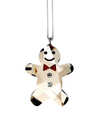 Simply adorable! This cute gingerbread man in Golden Shadow crystal is a real charmer with his Siam crystal bow tie, twinkling Jet eyes and friendly smile. Hanging on a white satin ribbon, this wonderfully nostalgic creation lends a sweet, festive touch to your Christmas tree or window.