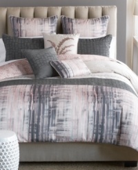 Define your space with unexpected design. A sleek gray color is softened by the relaxing pink hues of a perfect sunset in this Horseshoe Bay comforter set from Bryan Keith for a fresh, modern look. Flip the comforter for a soothing leaf design that gives your room a whole new look.