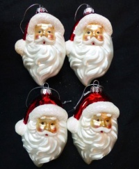 Set of 4 Glass Santa Claus Head Christmas Ornaments dated 2011, 4 tall