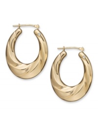 Gold. Glam. Gorgeous. Every girl needs a pair of hoop earrings, and Signature Gold's™ diamond-accented pair couldn't be more perfect. Crafted in 14k gold with a chic oval shape and draped design. Approximate drop length: 1-1/8 inches. Approximate drop width: 3/4 inch.