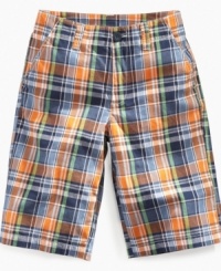 Playful in plaid. Get him ready for the day in these stylish and comfortable flat-front shorts from Nautica.