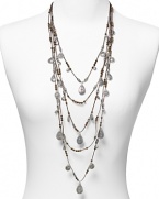 Lauren Ralph Lauren pays homage to Southwestern style with this layered drop necklace, accented by an evocative cascade of natural cord and textured silver-plated teardrop beads.