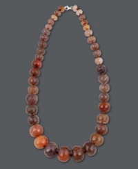 Light your look on fire! Avalonia Road's hot orange fire agate necklace (138-1/3 ct. t.w.) features a graduated design that highlights the neckline. Clasp crafted in sterling silver. Approximate length: 21 inches.