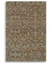 A blend of traditional and contemporary design elements, this unique piece displays an inviting, weathered look in chic blue-green colorways. Plush New Zealand wool gives the rug a soft surface that holds up in the busiest rooms in your home.