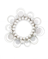 Beautiful beaded embellishment enhances the look of Style&co.'s stretch bracelet, which can adjust to fit nearly any wrist. Crafted in silver tone mixed metal. Approximate diameter: 2-1/4 inches.