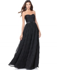 Adrianna Papell crafts this sweeping petite evening gown with a ton of textured embellishment, from its ruched bodice to a satin waistband to a rosette-covered, tulle-lined full skirt.