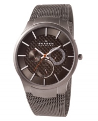 Titanium strength, Skagen Denmark style. This watch features a mesh titanium bracelet and round stainless steel case. Gray carbon fiber dial with silvertone stick indices, logo and three subdials. Quartz movement. Water resistant to 30 meters. Limited lifetime warranty.