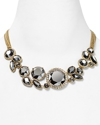 An instant statement piece. Gleaming, woven chains suspend a decadent bib of clustered hematite stones on this necklace from ABS by Allen Schwartz.