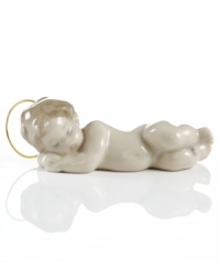 The artisans at Lladro have produced a small masterpiece in this sleeping baby Jesus figurine, complete with a metal halo. Handcrafted of porcelain in Spain.