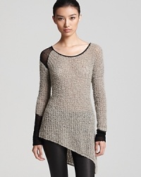 Turn the sidewalk into your own personal catwalk in this Helmut Lang bouclé, color-block sweater-modern and masterfully cool with sleek, coated jeans.