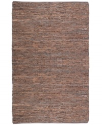 Olé! Spice up your decor with the gorgeously festive style of the Matador rug from St. Croix. Durable leather strips in warm, earthy hues are meticulously hand woven with fine cotton strands, resulting in a beautiful, rustic texture and natural braided pattern that accents even the most eclectic decor.