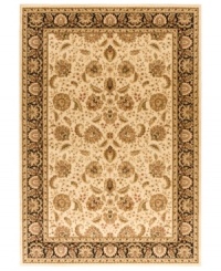 Taking its namesake from the original Kashan rugs of Persia, this area rug displays a regal look with intricate medallions in a light gold, cream, black colorway with hints of crimson. Made in the USA of lush, heat-set polypropylene for sheer durability and effortless style. (Clearance)